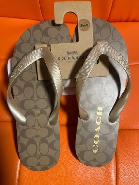 Coach Taupe and Metallic Gold Logo Flip Flop Sandals